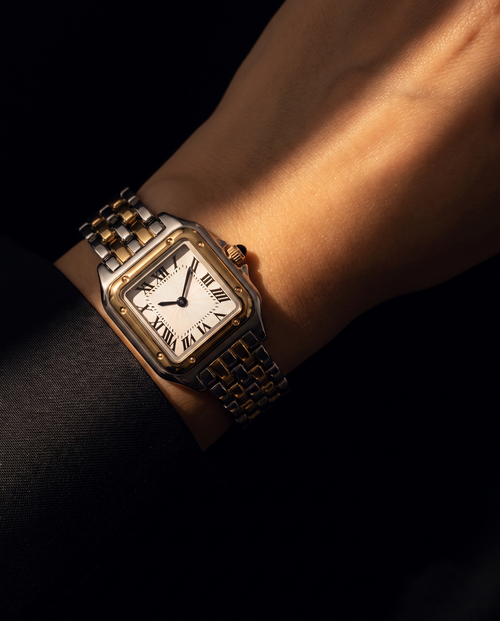 Velmora Aube two-tone watch worn on wrist